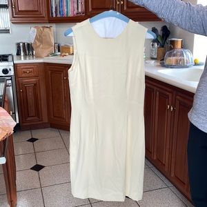 Cream below the knee dress